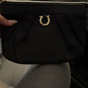 Salvatore Ferragamo Black Clutch with Gold Accent